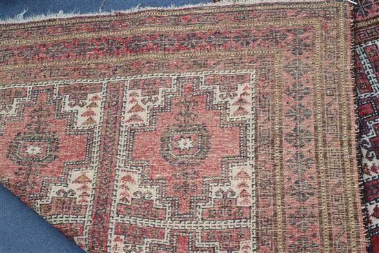 A Tekke Bokhara rug and a similar smaller rug 200 x 128cm and 165 x 95cm